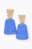 straw earrings with a gold accent