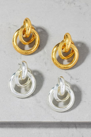 small, puffy hoop earring